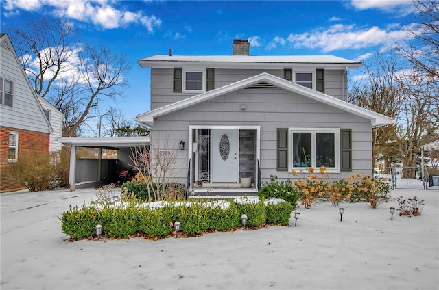 view of front of house with a carport