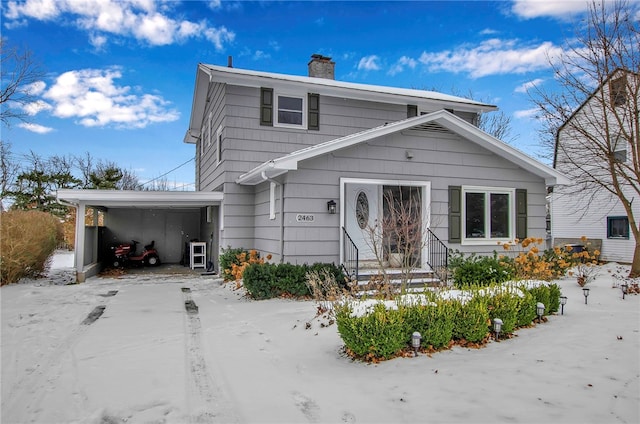 front facade with a carport