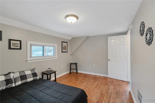 bedroom featuring light wood-type flooring