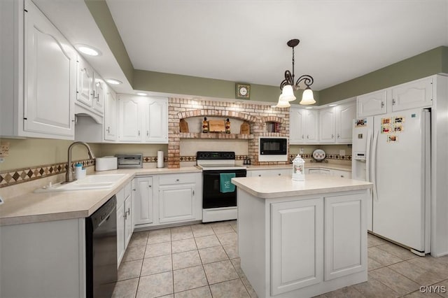 kitchen with sink, black appliances, decorative light fixtures, an inviting chandelier, and white cabinets