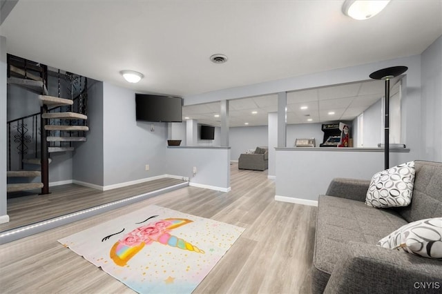 living room with light hardwood / wood-style floors