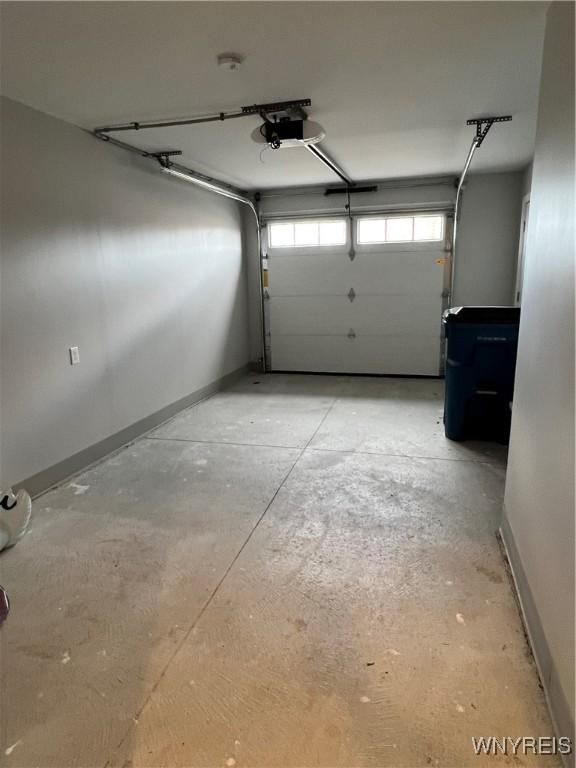 8977 Iroquois St, Evans, NY 14006 - garage with a garage door opener