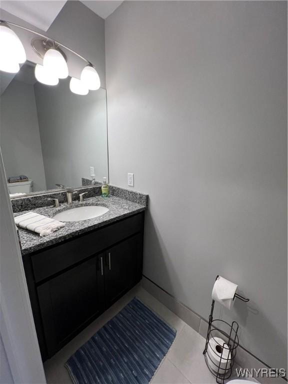 8977 Iroquois St, Evans, NY 14006 - bathroom featuring tile patterned floors and vanity
