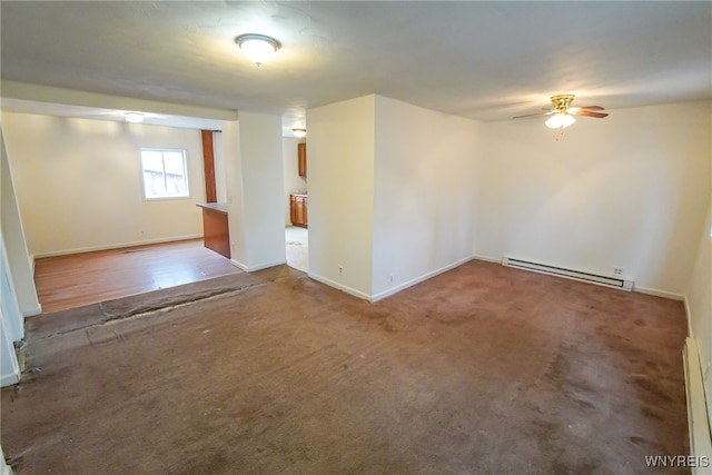 unfurnished room with carpet, ceiling fan, and baseboard heating