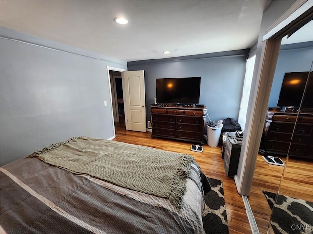 bedroom with light hardwood / wood-style flooring