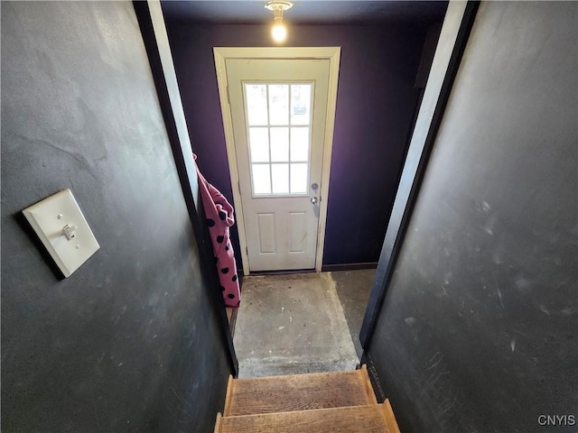 entryway with concrete floors