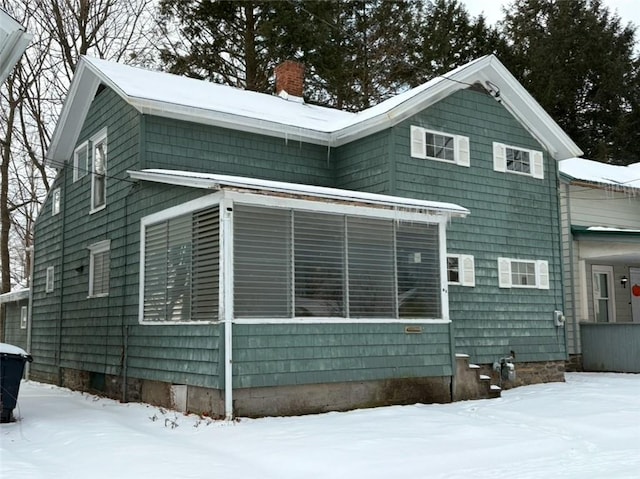 view of snow covered property