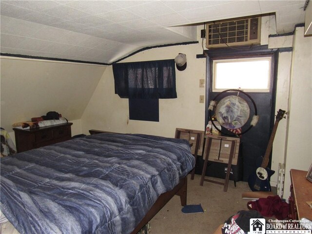 bedroom with vaulted ceiling