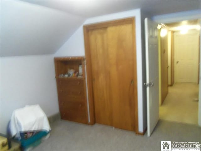 bedroom with vaulted ceiling