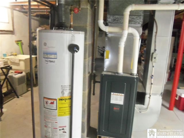 utility room with gas water heater