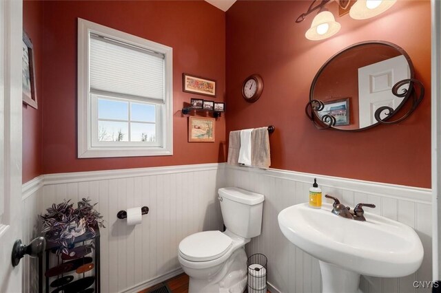 bathroom with toilet and sink