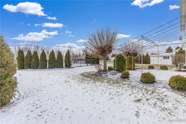 view of yard layered in snow