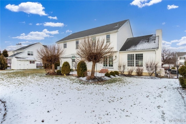 view of snow covered property