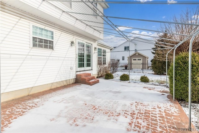 view of snow covered patio