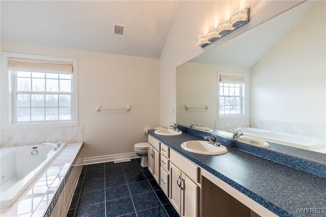 bathroom featuring vanity, a relaxing tiled tub, tile patterned flooring, toilet, and lofted ceiling