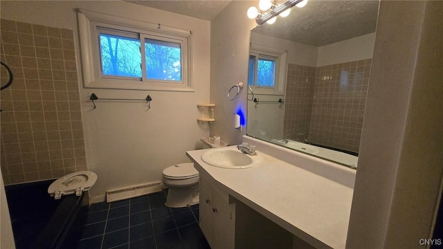 bathroom with tile patterned floors, vanity, a baseboard heating unit, tiled shower, and toilet