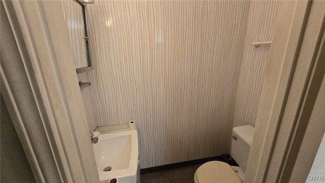 bathroom with toilet and sink