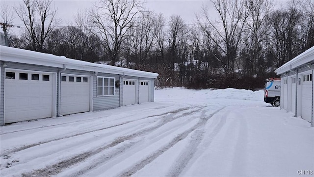 view of yard layered in snow