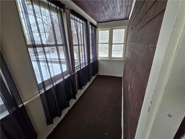 interior space featuring wood ceiling