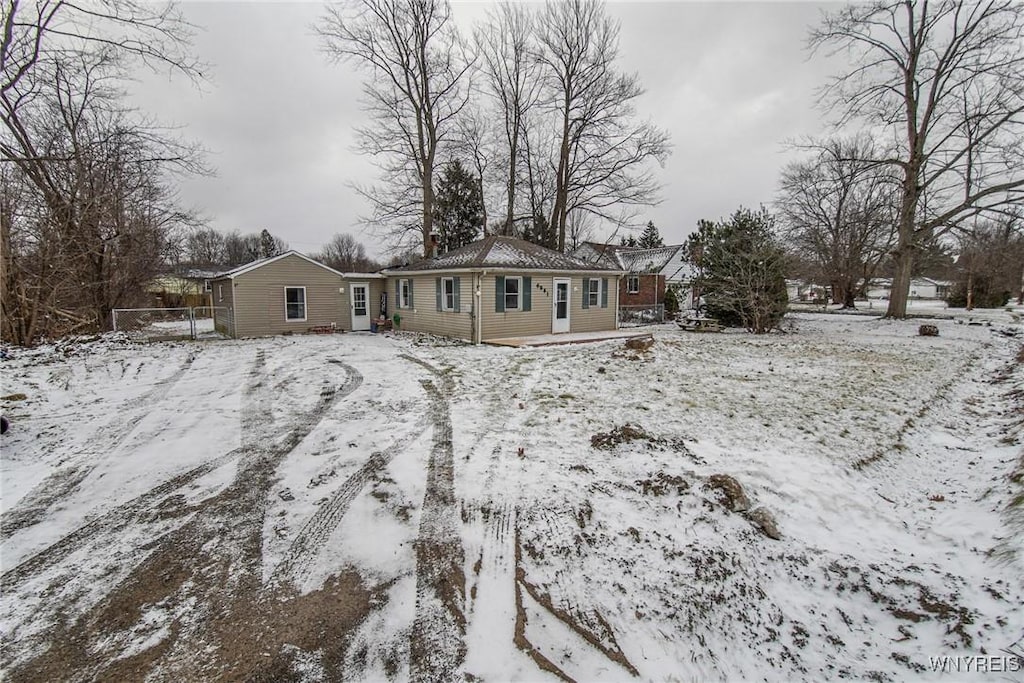 view of snow covered house