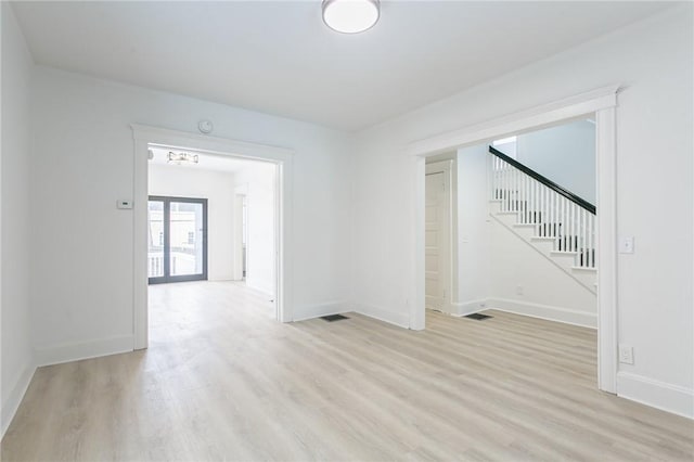 empty room with light wood-type flooring