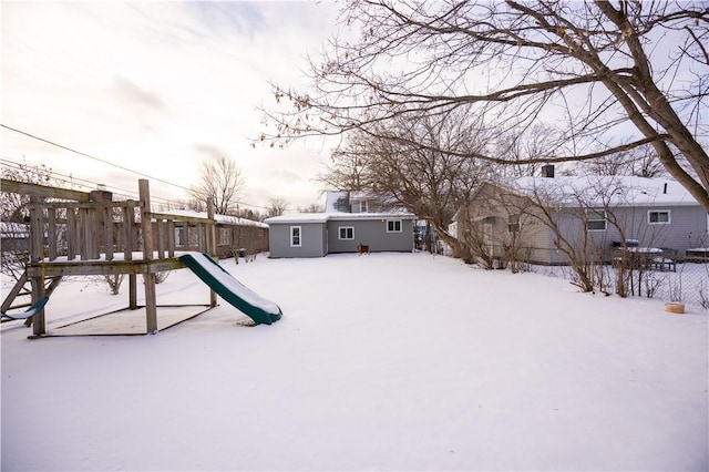 view of snow covered playground