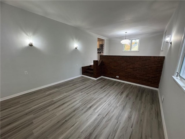 empty room featuring dark hardwood / wood-style floors