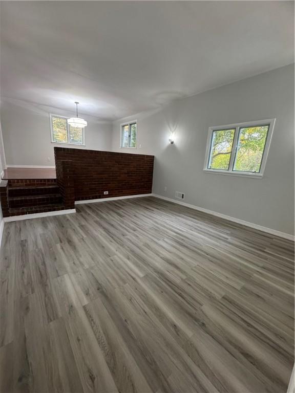 spare room featuring hardwood / wood-style floors