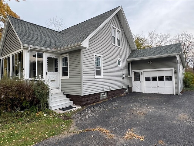 view of home's exterior with a garage