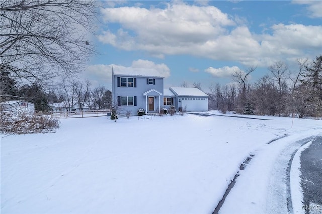 view of front of property featuring a garage