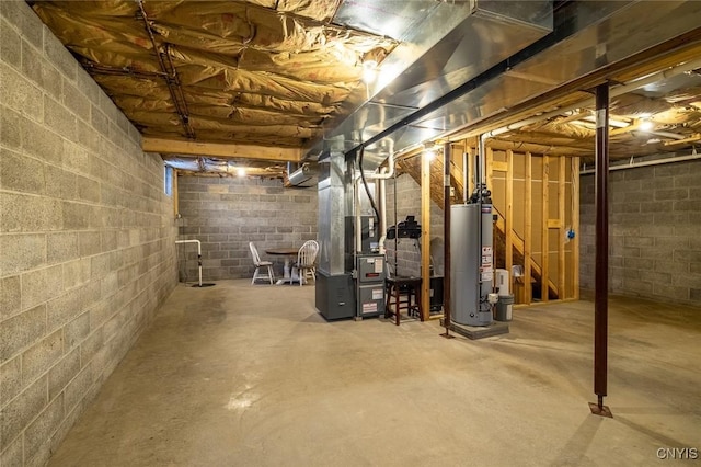 basement with gas water heater and heating unit