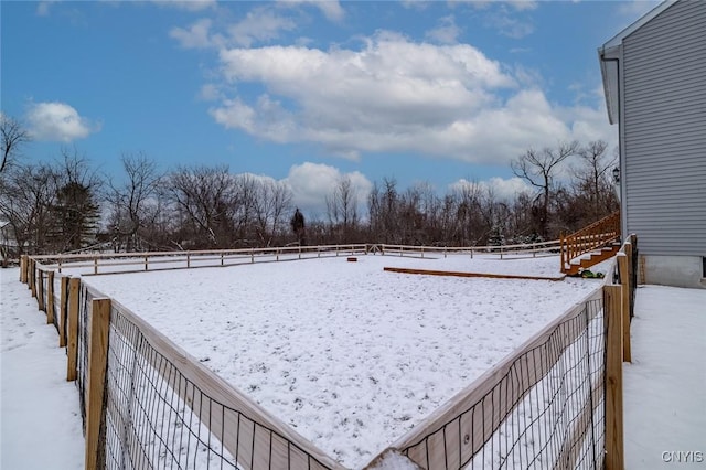 view of yard covered in snow