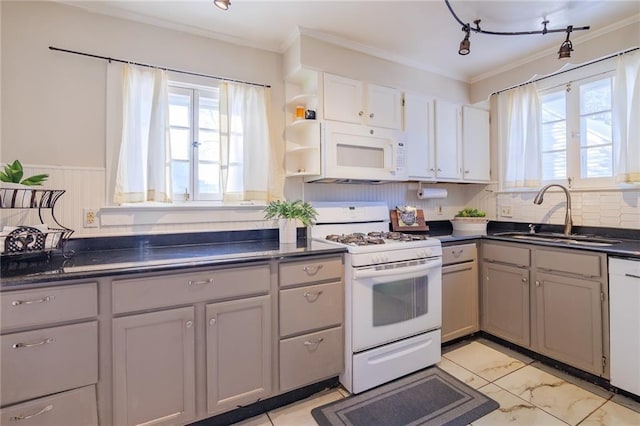 kitchen featuring white appliances, crown molding, sink, white cabinets, and gray cabinets