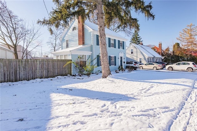 view of yard layered in snow