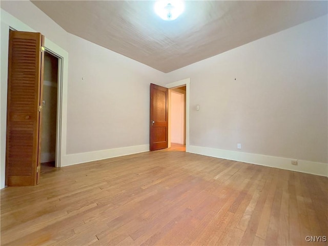 unfurnished room featuring light hardwood / wood-style floors