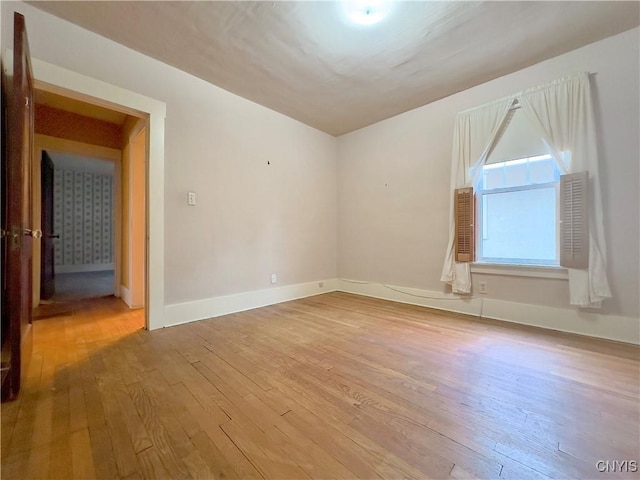 empty room with light wood-type flooring