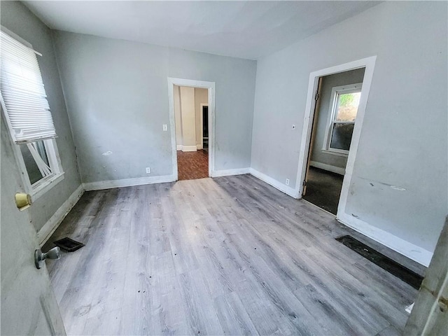 empty room featuring light hardwood / wood-style floors