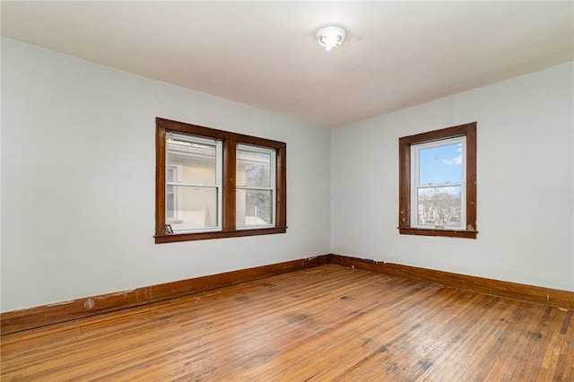 empty room featuring hardwood / wood-style flooring