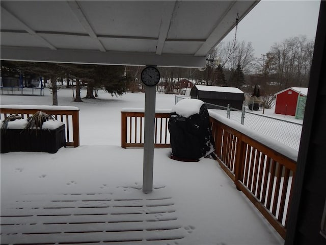 view of snow covered deck