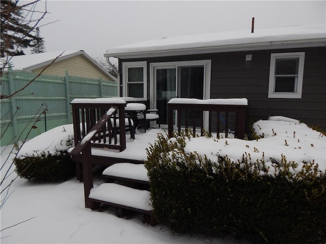 view of snow covered deck