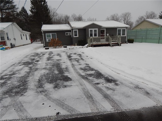 view of front of property featuring a deck