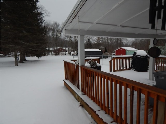 view of snow covered deck