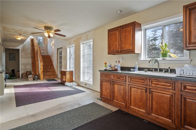 kitchen with ceiling fan and sink