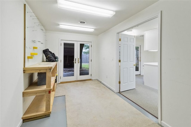 doorway to outside featuring french doors