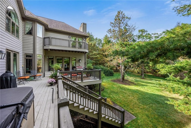 wooden terrace with a yard