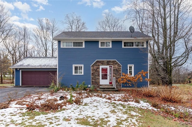 colonial home featuring a garage