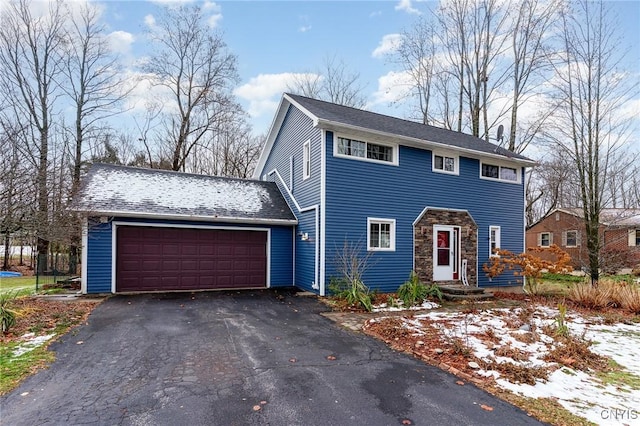 view of front of home with a garage