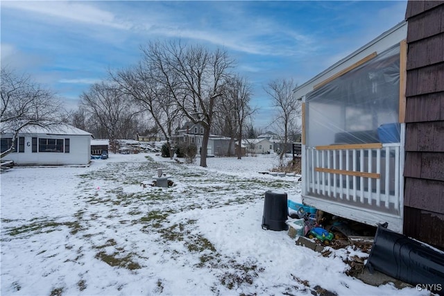 view of yard covered in snow