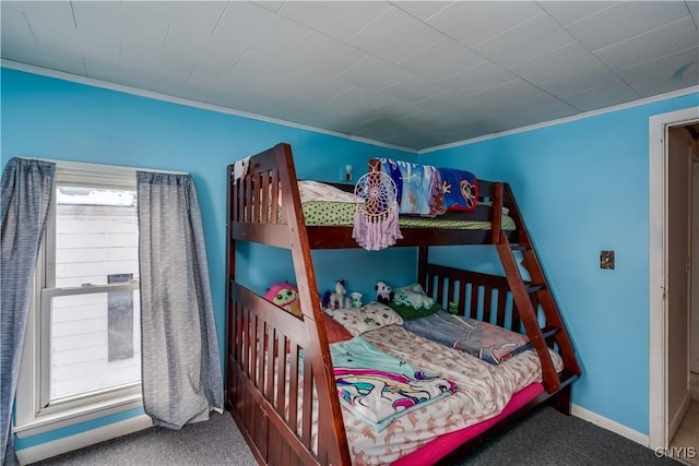 carpeted bedroom with crown molding