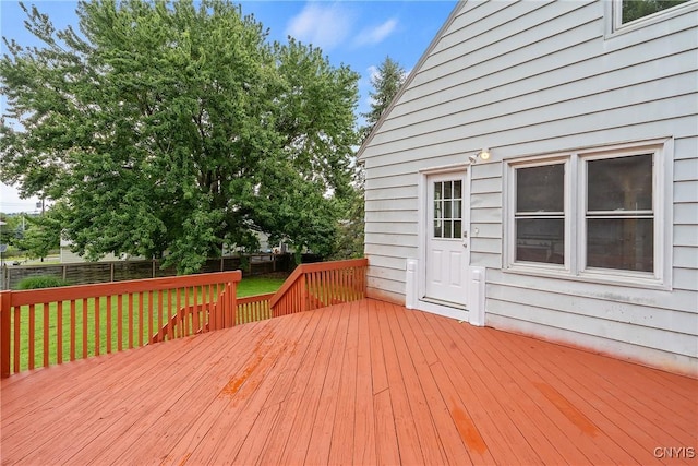 deck featuring a lawn